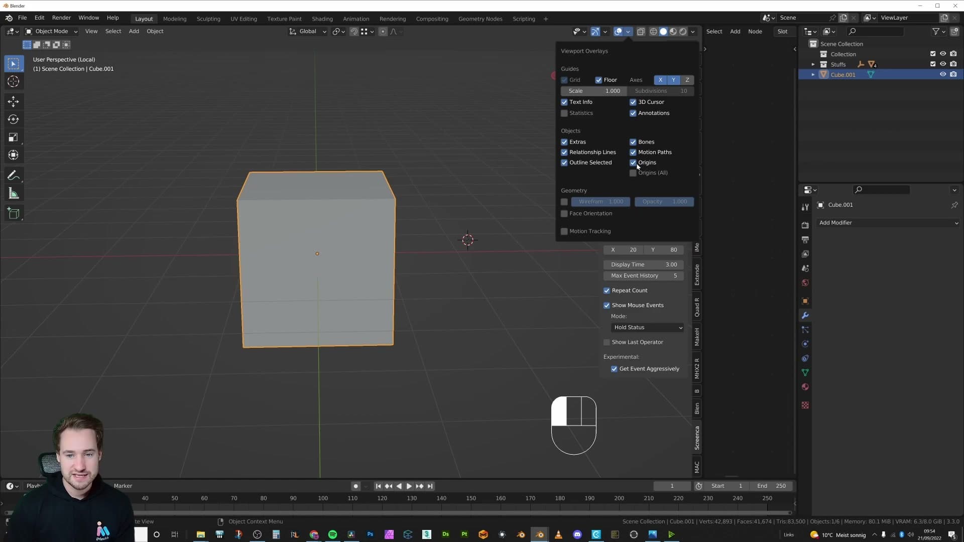The yellow origin dot sitting at the centre of a default cube. Mirror modifier is on but the geometry doesn't change.